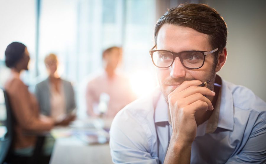 Employee contemplating Black Friday Cyber Monday 2020 data